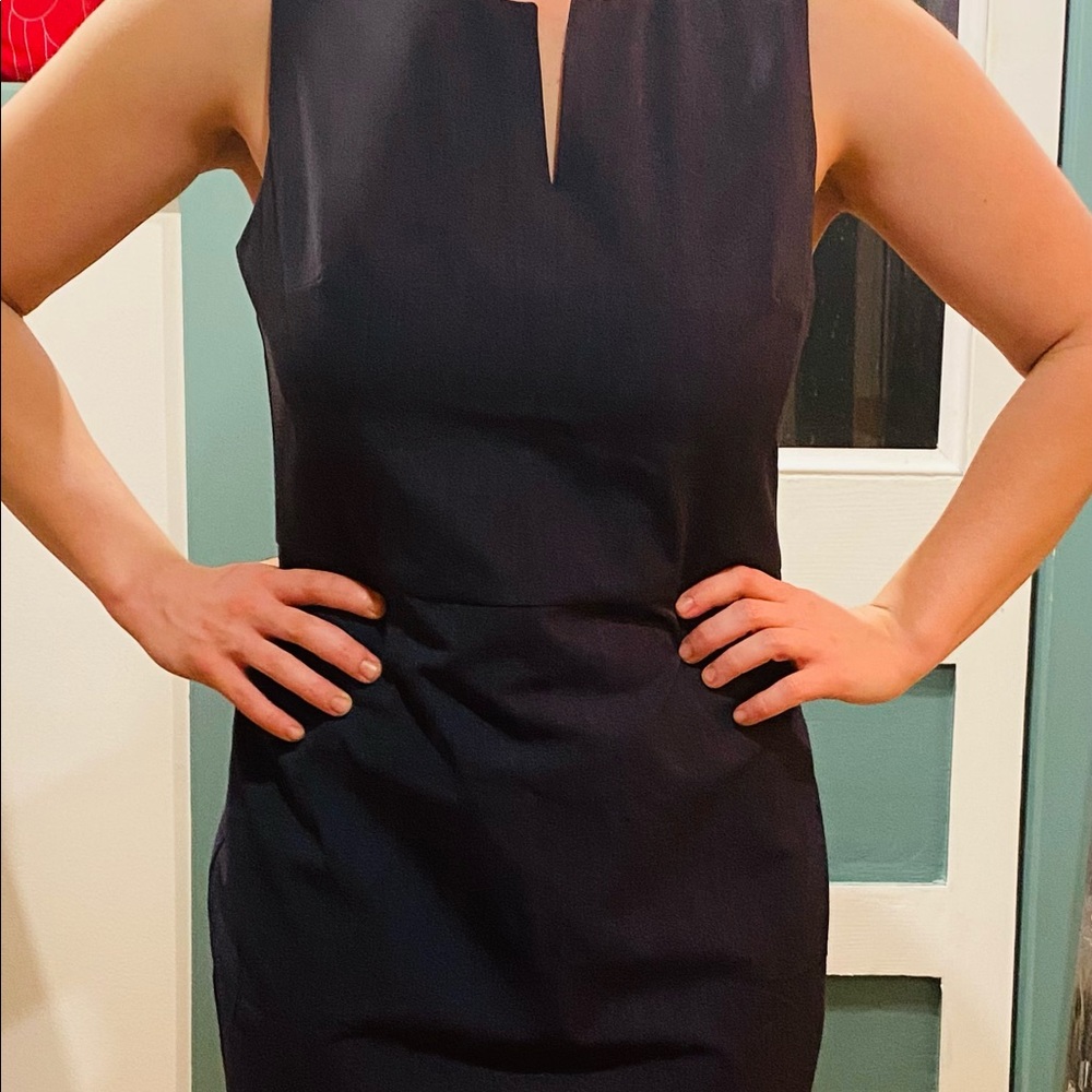 Elegant Ann Taylor, knee length blue dress. Never worn, still has tags!
